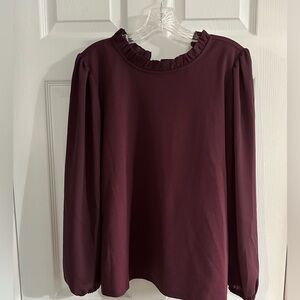Blouse with ruffle neck detail